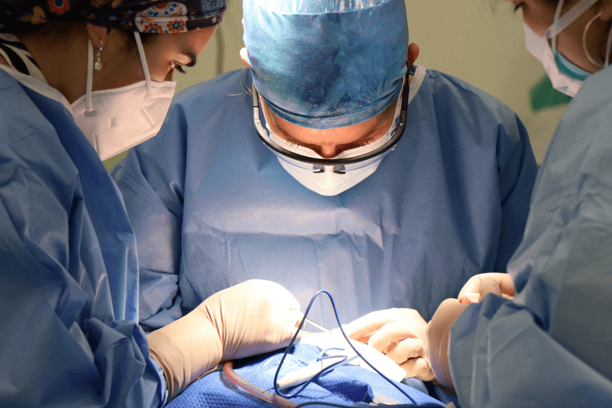 Surgeons performing intra-operative brachytherapy procedure